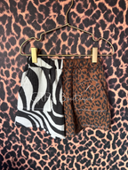 Animal print shorts with pockets and elastic waist for kids sizes 0/3 month to 5/6 year olds 