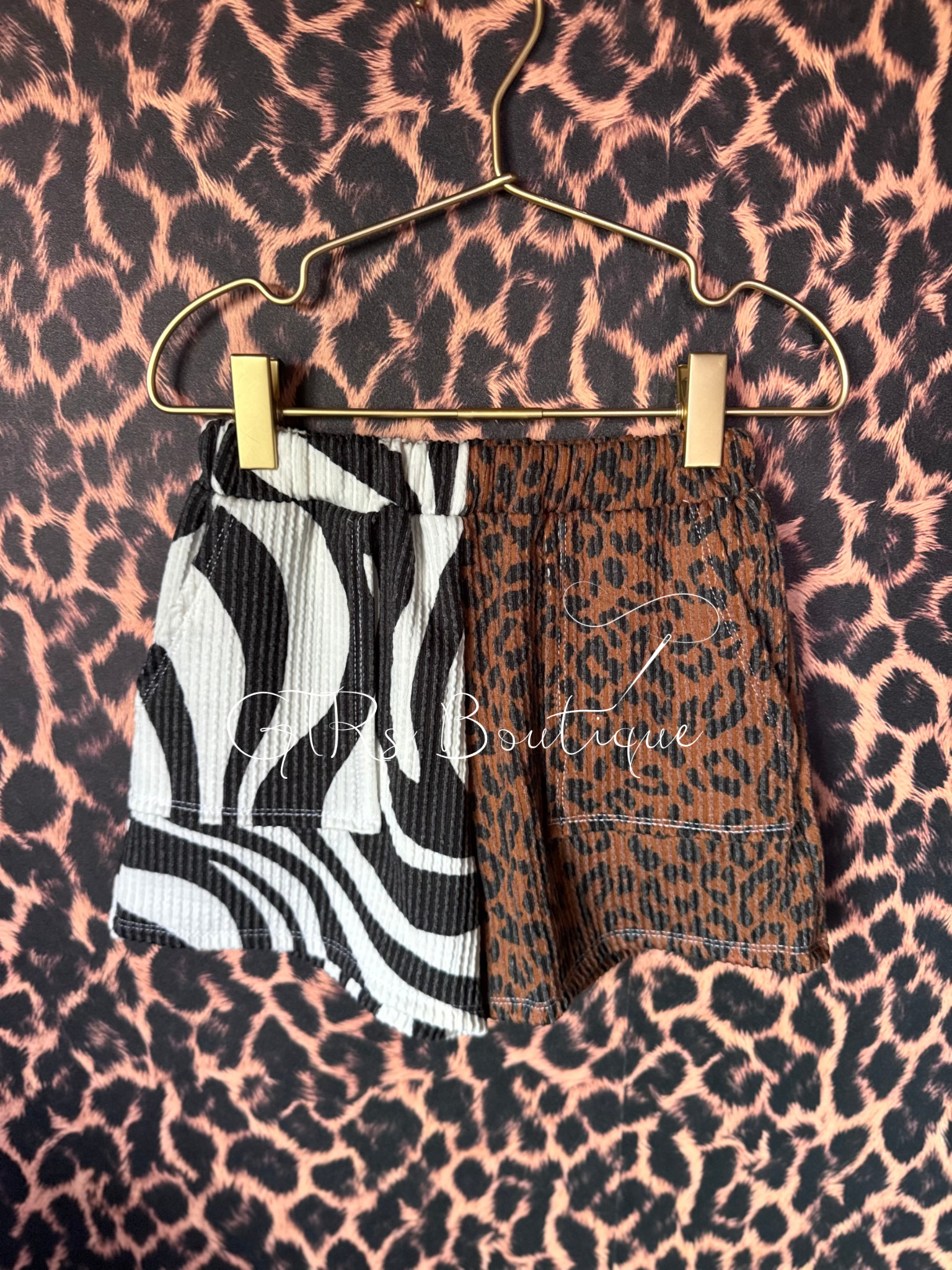 Animal print shorts with pockets and elastic waist for kids sizes 0/3 month to 5/6 year olds 